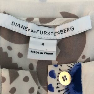 DVF woman’s size 4 100%silk shirt dress with belt